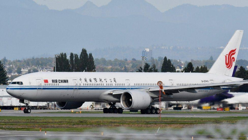 Chuyến bay của Air China chở bà Mạnh Vãn Chu trở về Trung Quốc (ảnh Reuters)