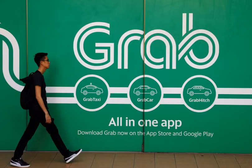 Thêm 2 quốc gia giám sát việc Uber sáp nhập Grab (ảnh: CBS News)