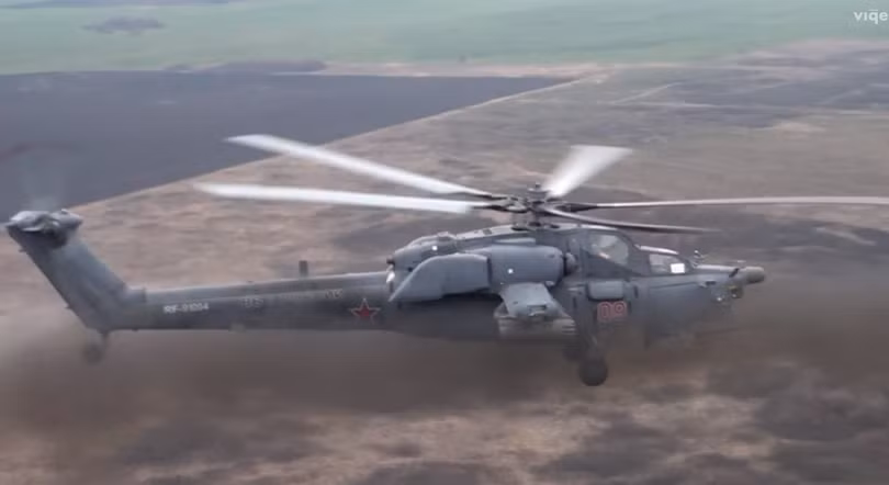 Trực thăng Thợ săn đêm Mi 28N tấn công mục tiêu bằng rocket.