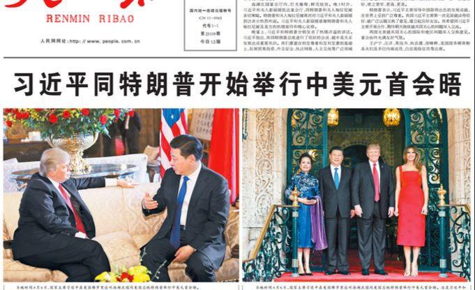 Hình: Theo The New York Times, báo chí Trung Quốc (trong hình là tờ Nhân dân Nhật báo) hoan hỉ đăng tấm hình Trump ngồi tiếp chuyện Tập trong đó Trump ngồi tựa vào sofa, tay xõa lên thành ghế, trong khi Tập ngồi thẳng, tư thế nghiêm nghị, thể hiện nhiều quyền lực hơn, và hàm ý rằng bức hình biểu tượng cho thế cửa trên của Tập so với Trump.