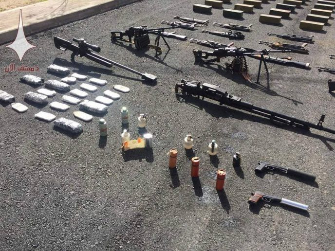 Quân đội Syria chiếm giữ lượng vũ khí lớn chuyển vào tử địa Đông Ghouta ảnh 2