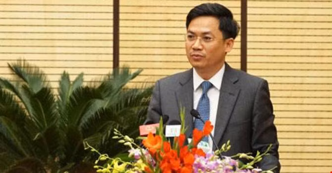 Ông Hà Minh Hải, Cục trưởng Cục Thuế Hà Nội trả lời chất vấn về nợ thuế. Ảnh: Minh Huệ