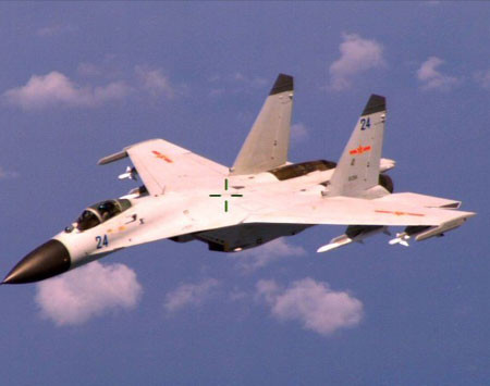 Tiêm kích Trung Quốc J-11 bay trên Biển Đông trong không phận quốc tế, ngày 19 /8/2014 (U.S. Navy Photo/Released)