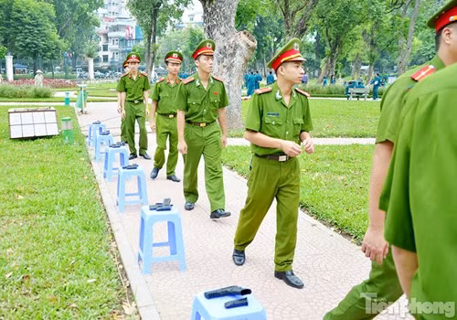 Xem chiến sĩ cảnh sát tập luyện với súng ngắn hiện đại - ảnh 14