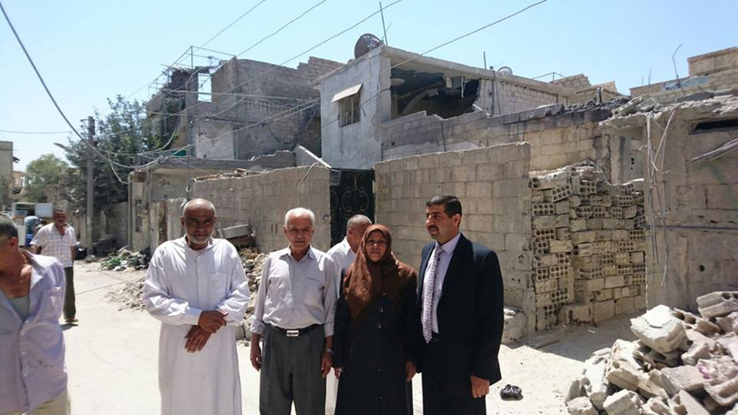 Trưởng lão và các thành viên của nhóm hòa giải dân tộc ở thị trấn Khan al- Shih