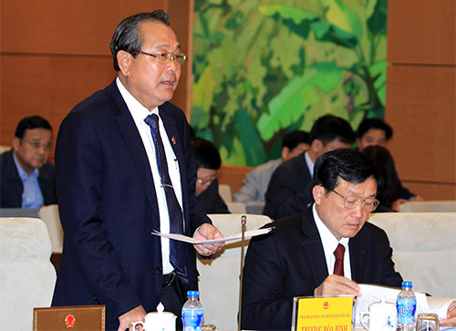 Chánh án Tòa án nhân dân tối cao Trương Hòa Bình trả lời chất vấn. Ảnh: An Đăng - TTXVN 