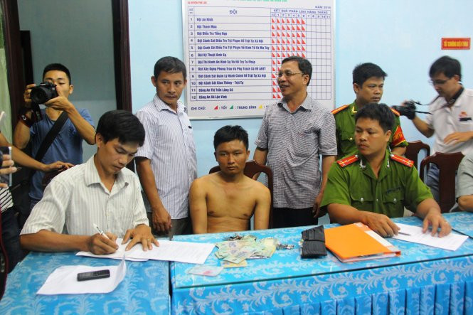 Nghi phạm Nguyễn Văn Nghĩa đang bị bắt giữ tại cơ quan điều tra Công an huyện Phú Lộc - Ảnh: Nguyên Linh