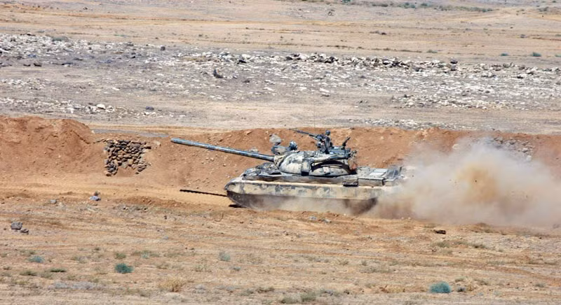 Xe tăng quân đội Syria tiến công trên chiến trường Al-Safa. Ảnh minh họa South Front