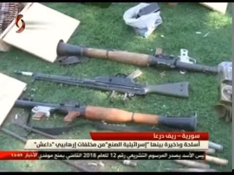 Quân đội Syria thu giữ kho vũ khí của IS ở Daraa. Ảnh minh họa kênh truyền hình Al-Ikhbariya