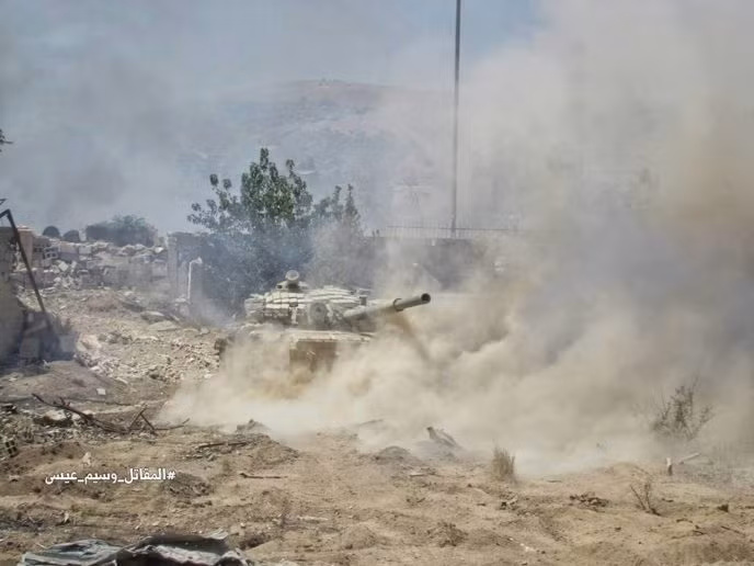Quân đội Syria tấn công dữ dội phe thánh chiến cố thủ đông Damascus ảnh 12