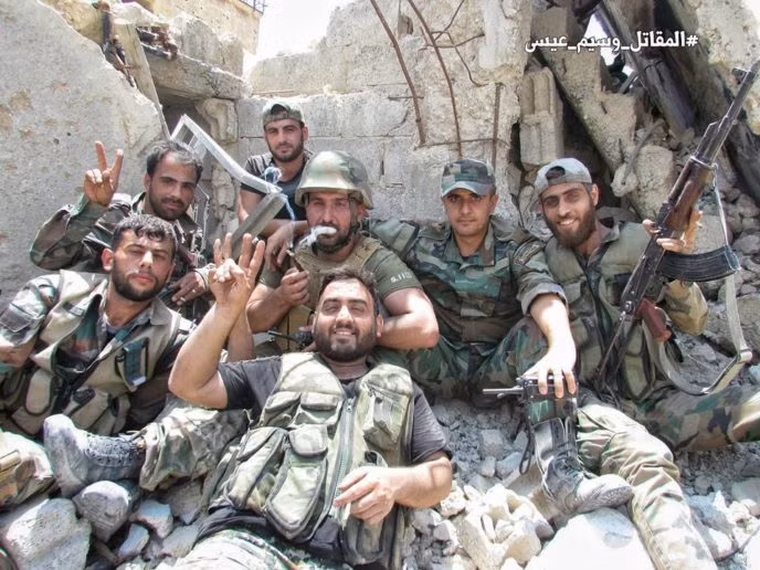 Quân đội Syria tấn công dữ dội phe thánh chiến cố thủ đông Damascus ảnh 11