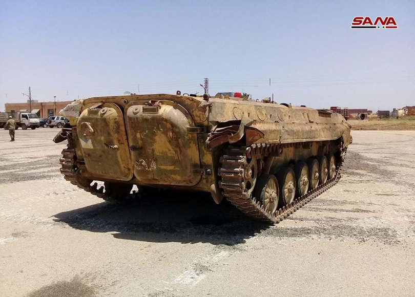 Một số vũ khí trang bị điển hình của lực lượng Hồi giáo cực đoan bị quân đội Syria thu giữ ở vùng đông bắc Daraa. Ảnh SANA