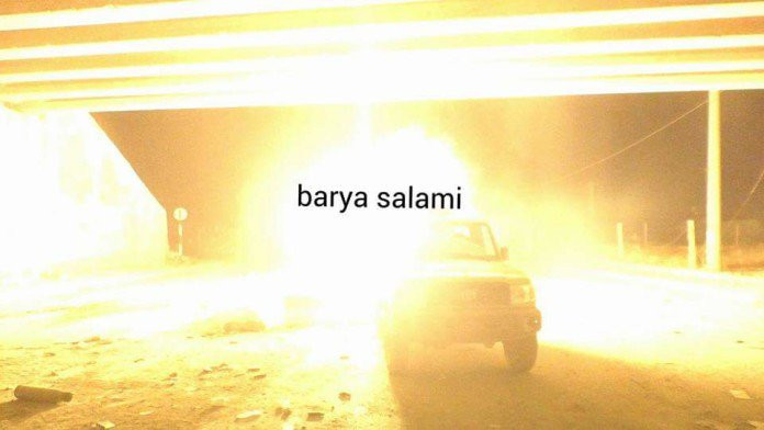 Xe ô tô quân đội Syria tiến lên cầu Ramouseh