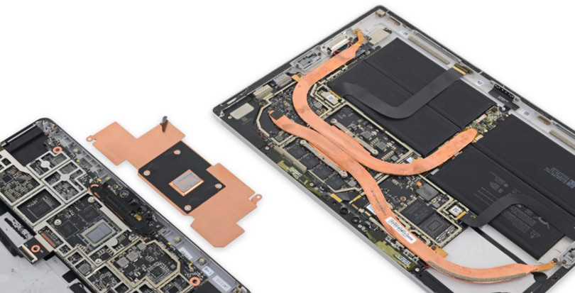Tất cả linh kiện nhồi nét trong thiết bị mỏng chỉ 8,3 mm và không có ống hay quạt tản nhiệt. Ảnh: iFixit