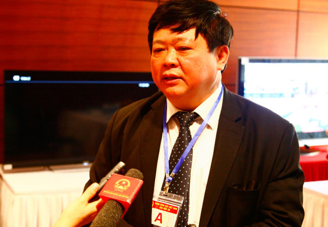 Ông Nguyễn Thế Kỷ trả lời báo chí bên lề Đại hội Đảng lần thứ XII - Ảnh: Viễn Sự