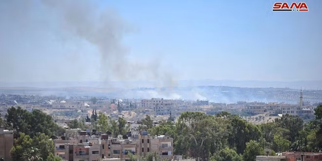 Lực lượng pháo binh tên lửa Syria tấn công HTS ở Daraa. Ảnh minh họa SANA