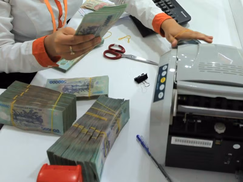 Nợ xấu dự kiến về dưới 3% vào cuối năm 2015. Ảnh:Đức Thanh