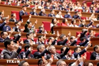 Các đại biểu dự phiên thảo luận ở hội trường về các văn kiện Đại hội XIV của Đảng.