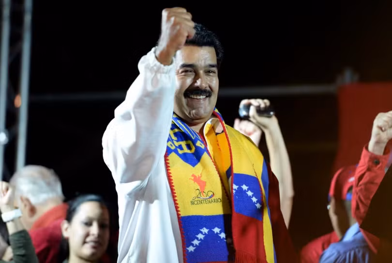 Tổng thống Venezuela Nicolas Maduro phát biểu sau khi kết quả chính thức đầu tiên của cuộc bầu cử được công bố tại Caracas, Venezuela vào ngày 8/12/2013. Ảnh: AFP.