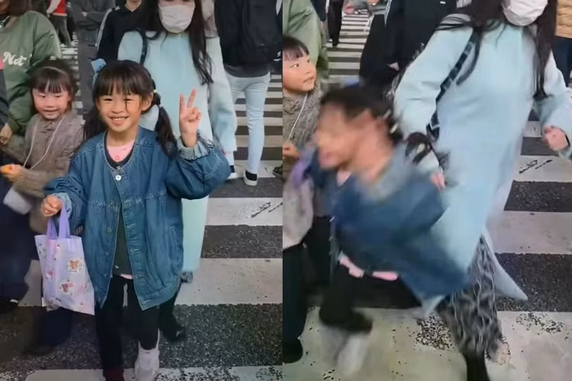 Ảnh chụp màn hình từ một video lan truyền trên mạng xã hội cho thấy bé gái bị xô ngã tại ngã tư Shibuya nổi tiếng ở Tokyo, Nhật Bản. Ảnh: Instagram.