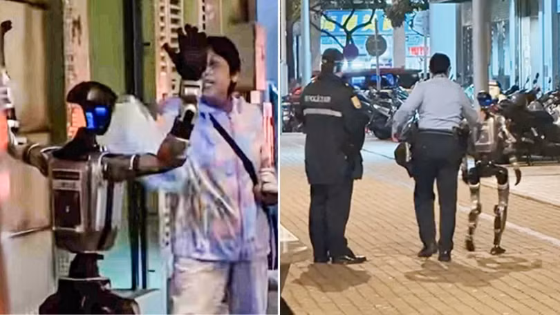 Một người máy hình người được cảnh sát hộ tống trên đường phố Macau, Trung Quốc. Ảnh: IE.