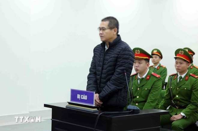 Bị cáo Đỗ Văn Ngà nhận mức án 7 năm tù về tội “Làm, tàng trữ, phát tán, tuyên truyền thông tin, tài liệu nhằm chống Nhà nước Cộng hòa xã hội chủ nghĩa Việt Nam” theo quy tại Điều 117-Bộ luật Hình sự. (Ảnh: Phạm Kiên/TTXVN)