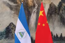 Quốc kỳ Nicaragua và Trung Quốc trước hội nghị được tổ chức tại Thiên Tân hôm 10/12 (Ảnh: Handout)