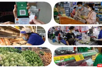 Có thẻ xanh COVID người dân vùng dịch được vào siêu thị mua hàng. Ảnh: Hoà Bình