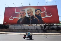 Tranh cổ động kêu gọi trả thù cho các nhà lãnh đạo Iran và Arab bị sát hại (Ảnh: Al Jazeera)