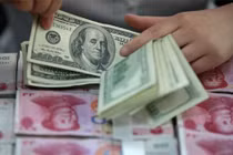 Ngày 7/1, tỷ giá đồng Nhân dân tệ so với USD rớt xuống mức thấp nhất trong 5 năm.
