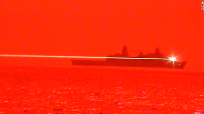 Hình ảnh hệ thống vũ khí laser trên tàu Portland phát xạ (Ảnh: Sputnik). Hình ảnh hệ thống vũ khí laser trên tàu Portland phát xạ (Ảnh: Sputnik).