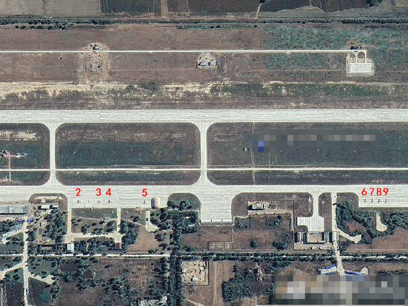 Ảnh vệ tinh chụp 9 máy bay không người lái tầm cao WZ-7 Xiang Long bố trí tại sân bay Song Liễu, gần biên giới Triều Tiên.