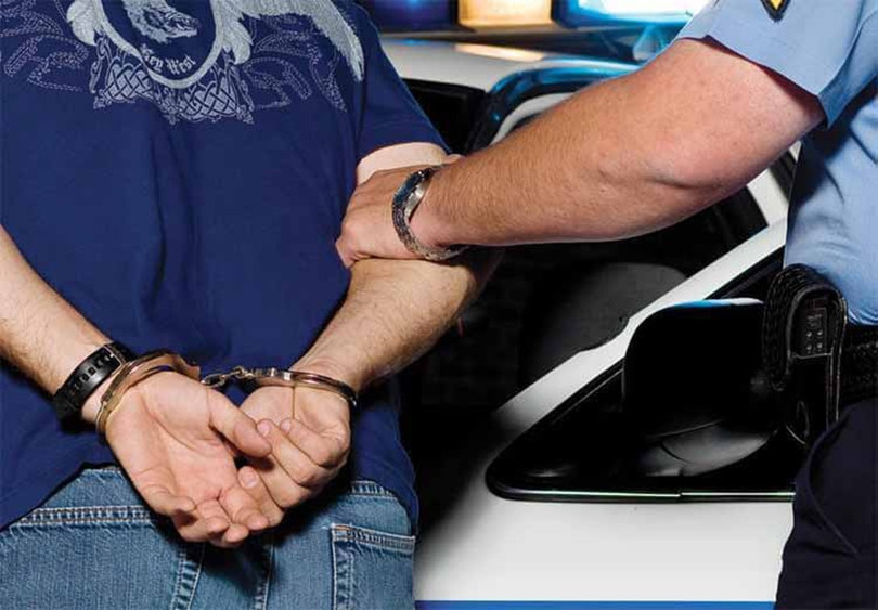 Ron Hansen bị bắt tại sân bay khi đang tìm cách tới Trung Quốc