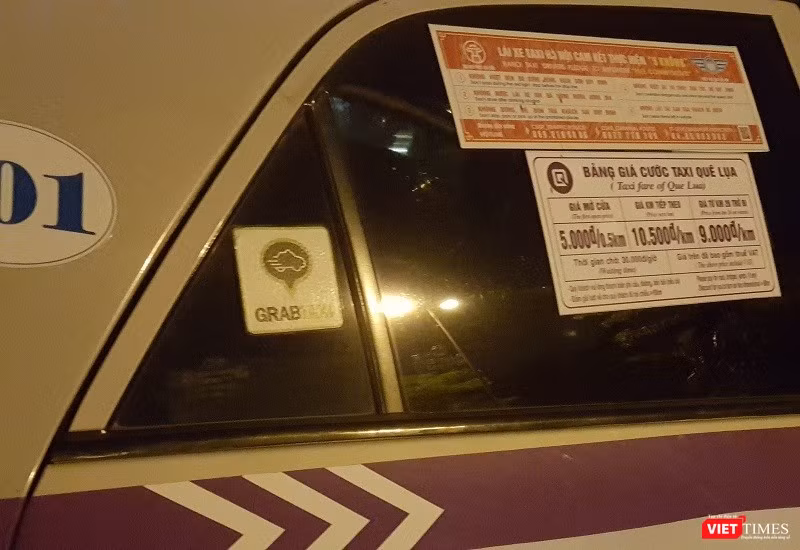 Hà Nội “siết” hoạt động của Uber Grab, đặt biển cấm theo giờ tại 13 tuyến phố ảnh 1 “Đại chiến