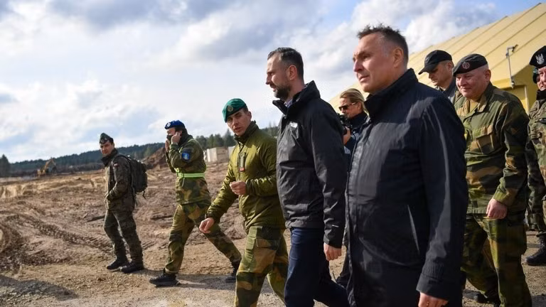 Các quan chức từ các nước EU tại lễ khai mạc Trại Jomsborg ở Lipa, Ba Lan, ngày 1/10. Ảnh: Getty.