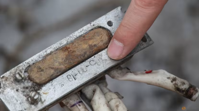 Một phần của tên lửa không xác định, mà chính quyền Ukraine tin rằng được sản xuất tại Triều Tiên và đã được sử dụng trong một cuộc tấn công ở Kharkiv vào đầu tuần này. Ảnh: Reuters.