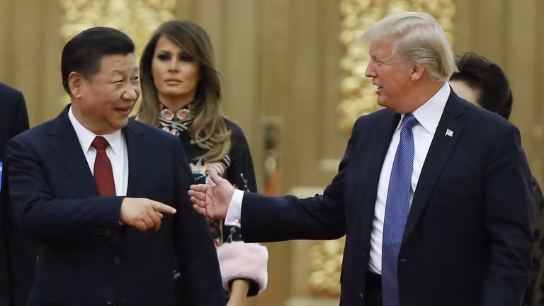 Chủ tịch Trung Quốc Tập Cận Bình và Tổng thống Mỹ Donald Trump tại tiệc tối cấp nhà nước ở Đại lễ đường Nhân dân, Bắc Kinh, Trung Quốc, ngày 9/11/2017. Ảnh: Getty.