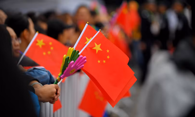 Văn bản mới tập trung xây dựng lòng yêu nước, đạo đức của công dân (Ảnh: Guardian)