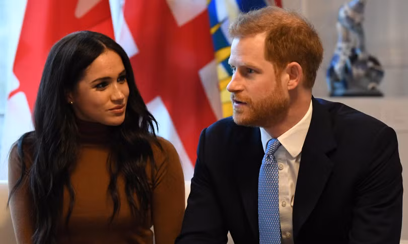 Vợ chồng Hoàng tử Harry trong một chuyến thăm Canada (Ảnh: Guardian)