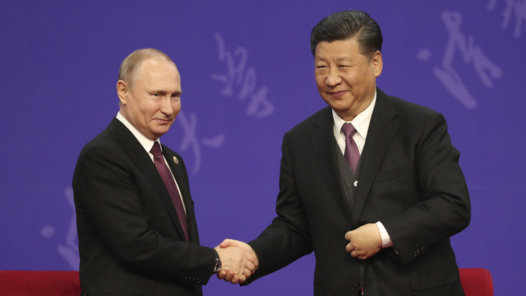 Tổng thống Nga Vladimir Putin và Chủ tịch Trung Quốc Tập Cận Bình. Ảnh: Getty.