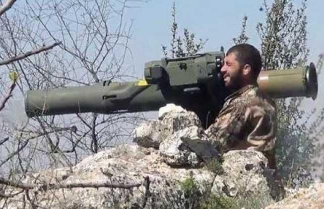 Quân nổi dậy ở Syria sử dụng tên lửa TOW (Ảnh: Military Watch)