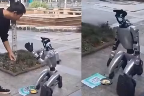 Robot hình người đi xin quyên góp trên đường phố làm dấy lên cuộc tranh luận mới về trí tuệ nhân tạo. Ảnh: MoneyControl.