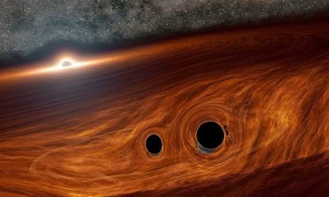 Mô phỏng vụ sáp nhập của hai hố đen xảy ra gần hố đen thứ ba. Ảnh: NASA. Mô phỏng vụ sáp nhập của hai hố đen xảy ra gần hố đen thứ ba. Ảnh: NASA.