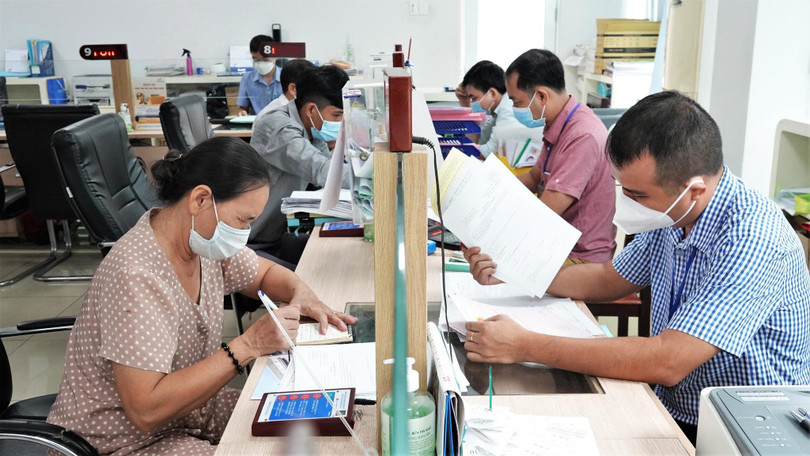 TP.HCM đang có số lượng công chức, viên chức nhiều hơn số lượng được T.Ư giao. Ảnh- Sỹ Đông (Báo Thanh Niên)