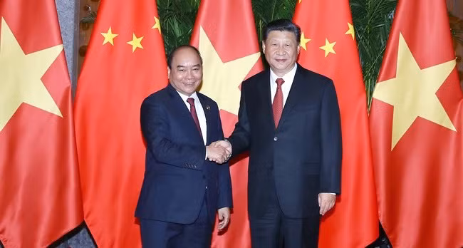 Thủ tướng Nguyễn Xuân Phúc và Tổng Bí thư, Chủ tịch Trung Quốc Tập Cận Bình. Ảnh: VGP