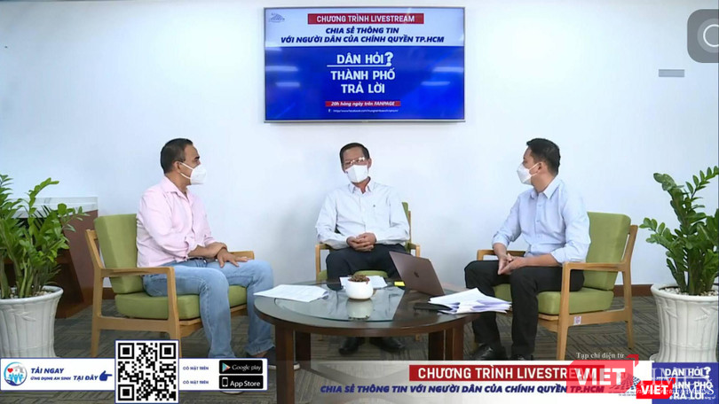 Chủ tịch UBND TP.HCM Phan Văn Mãi trong giao lưu trực tuyến, MC Quyền Linh (bên trái) và Lê Quang Tự Do (bên phải). Ảnh chụp màn hình Chủ tịch UBND TP.HCM Phan Văn Mãi trong giao lưu trực tuyến, MC Quyền Linh (bên trái) và Lê Quang Tự Do (bên phải). Ảnh chụp màn hình