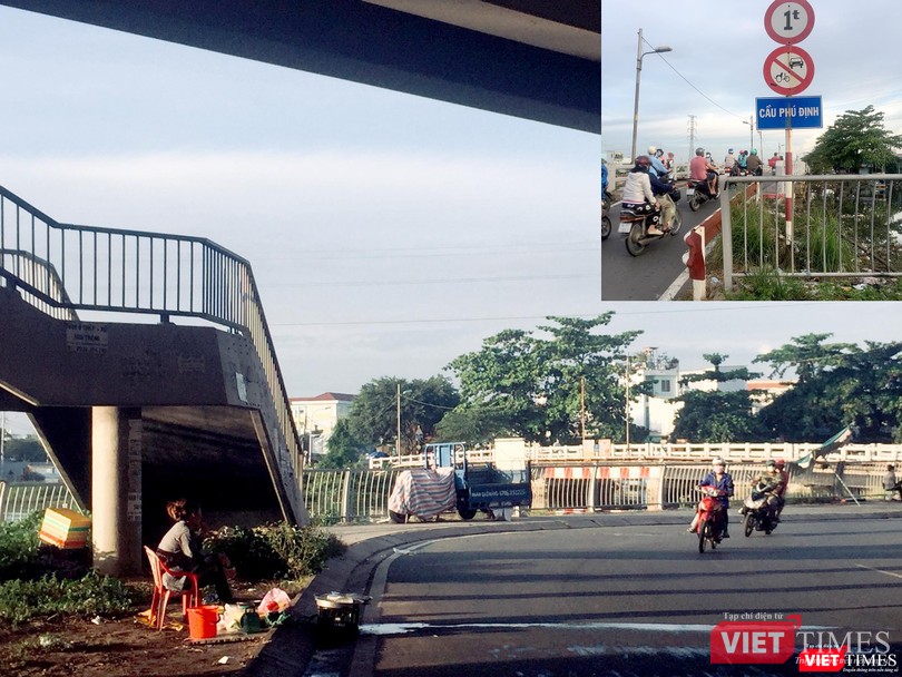 Từ đại lộ Võ Văn Kiệt quẹo xuống có cây cầu cũ kỹ đề "cầu Phú Định". Nhưng đây không phải cây cầu Phú Định được mong ngóng. Từ đại lộ Võ Văn Kiệt quẹo xuống có cây cầu cũ kỹ đề "cầu Phú Định". Nhưng đây không phải cây cầu Phú Định được mong ngóng.