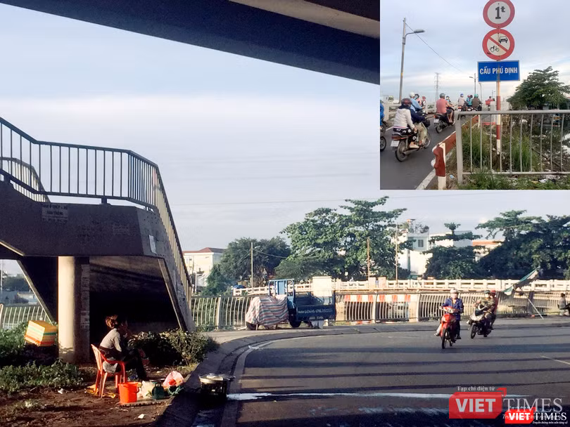 Từ đại lộ Võ Văn Kiệt quẹo xuống có cây cầu cũ kỹ đề "cầu Phú Định". Nhưng đây không phải cây cầu Phú Định được mong ngóng.