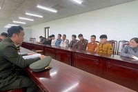 Các đối tượng tại cơ quan công an.