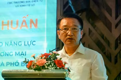 Ông Huỳnh Xuân Sơn, Phó Giám đốc lãnh đạo Sở Công thương TP Đà Nẵng phát biểu tại hội nghị. Ảnh XM.